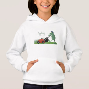 Funny green frog mowing grawn cartoon
