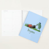Funny green frog mowing grawn cartoon planner (Display)