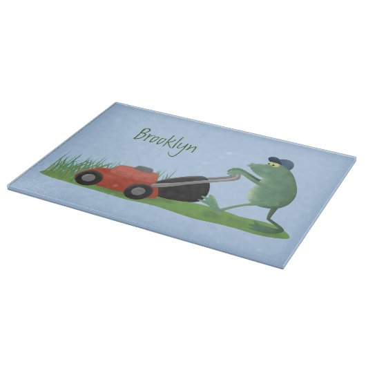 Funny green frog mowing grawn cartoon snijplank (Hoek)