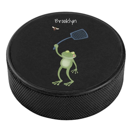 Funny green frog swatting fly cartoon hockey puck (3/4)