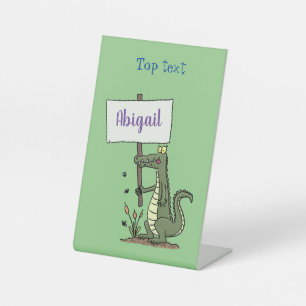 Funny krokodillenuitlijker met gebarentaal cartoon reclamebord met voetstuk