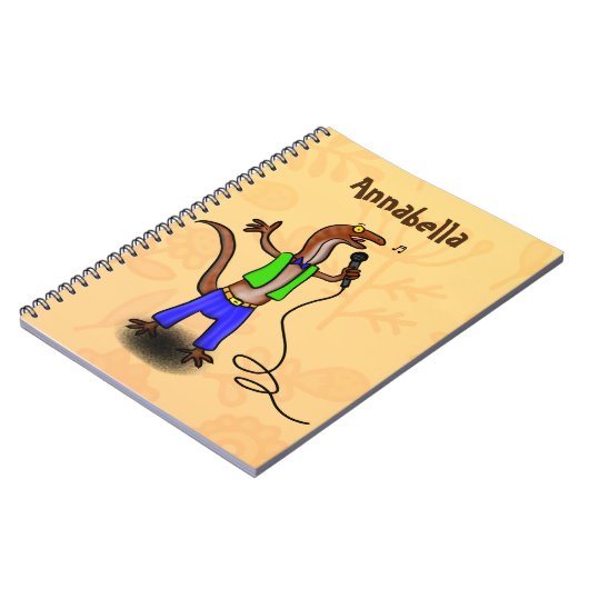 Funny lizard zingt met cartoon van de microfoon notitieboek (Linkerzijde)