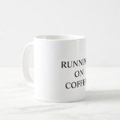 Funny mug states "RUNNING ON COFFEE" (Devant gauche)
