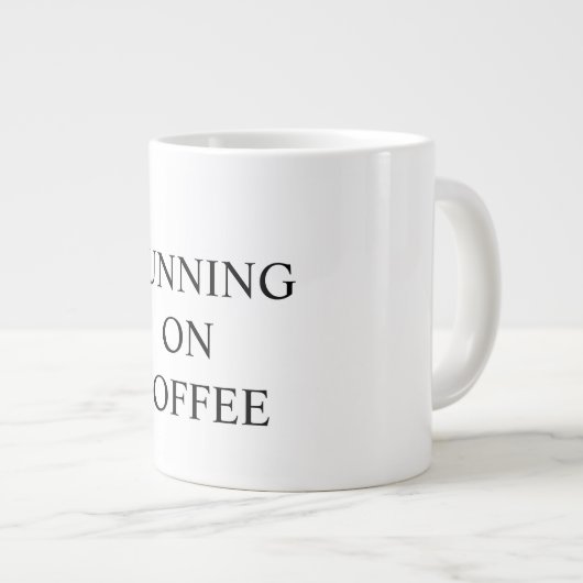 Funny mug states "RUNNING ON COFFEE" (Devant droit)