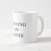 Funny mug states "RUNNING ON COFFEE" (Devant droit)
