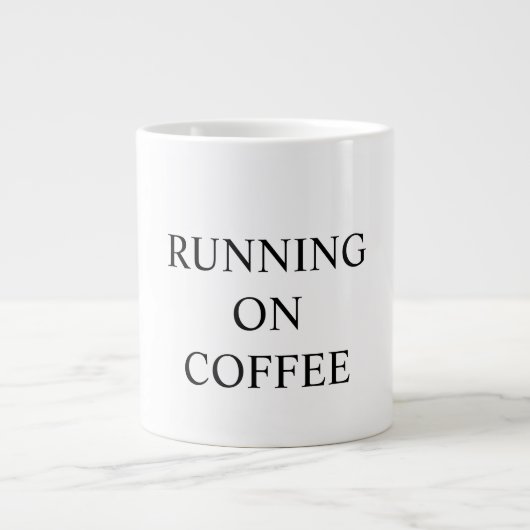 Funny mug states "RUNNING ON COFFEE" (Devant)