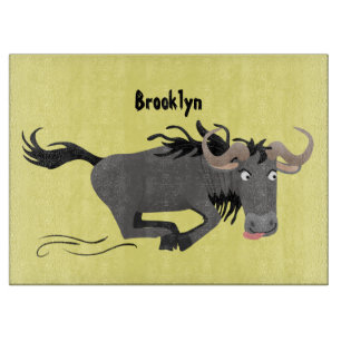 Funny wildebeest die de illustratie van de cartoon snijplank