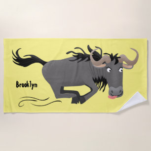 Funny wildebeest die de illustratie van de cartoon strandlaken