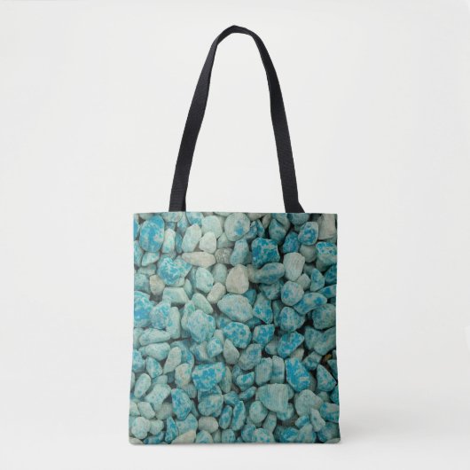 galets bleus sur un sac clair (Devant)