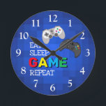 Gamer coloré | Horloge du jeu vidéo<br><div class="desc">Une horloge de joueur cool pour tous ces hommes et garçons qui aiment jouer ! Cela égayerait n'importe quelle pièce avec ses couleurs audacieuses.</div>