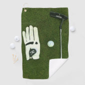 Gant de golf et balle sur l'herbe Golf Serviettes (En situation)