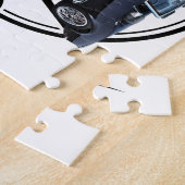 Garage met zwarte corvette Legpuzzel (Zijkant)