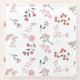 Geassorteerde delicate bloemen in patroon afdrukke glazen onderzetter