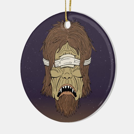 Geblindeerde polyfeus keramisch ornament (Links)