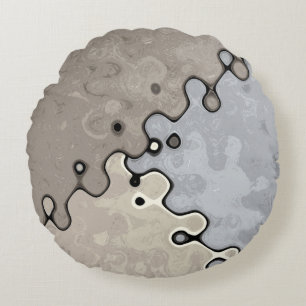 Gedempte aardetinten rond kussen