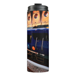 Geel en blauw trein, op station York Thermosbeker