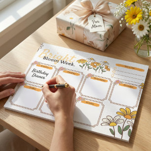 Geel en wit speels bloemendagplanner notitieblok