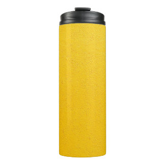 Geel geschilde wand thermosbeker