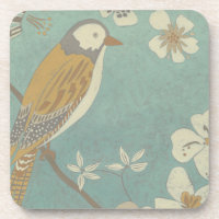 Geel, grijs en beige vogel op een bijkantoor