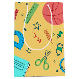 Geel schoolmateriaal voor terug naar school medium cadeauzakje