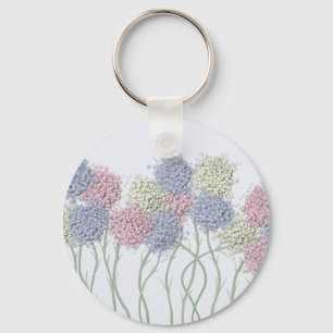 gekleurde deegbloemen sleutelhanger