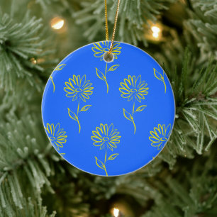 Gele bloem omlijning op een blauwe achtergrond keramisch ornament