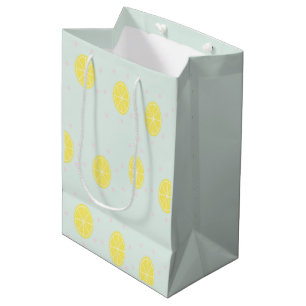 Gele citroenmoten op blauw medium cadeauzakje