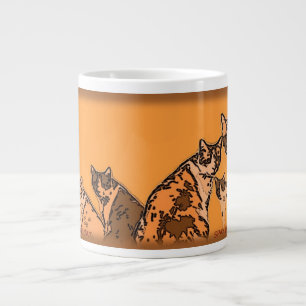 Gele en bruine katten grote koffiekop