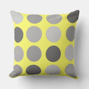 Gele en grijze poka dots werpen kussen