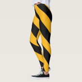 Gele en zwarte diagonale strepen leggings (Links)