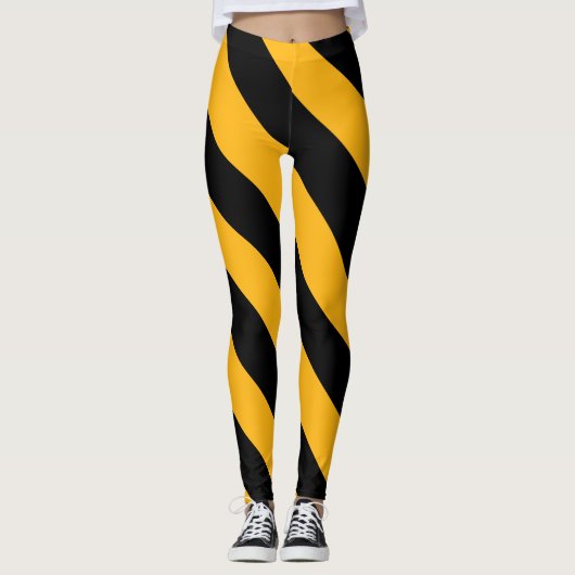 Gele en zwarte diagonale strepen leggings (Voorkant)