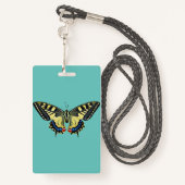 Gele en zwarte vlinder badge (Achterkant met draagriem)