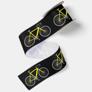 Gele fiets op zwart lint