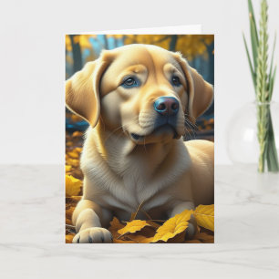 Gele Lab Puppy Speelt in Herfstbladeren Kaart