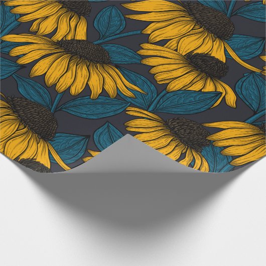 Gele naalden op donkerblauw cadeaupapier (Hoek)