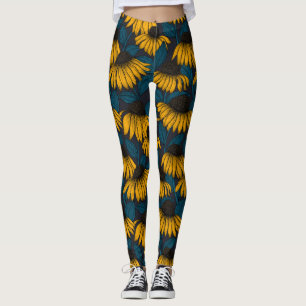 Gele naalden op donkerblauw leggings