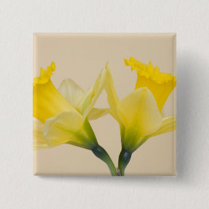 Gele narcissen vierkante button 5,1 cm