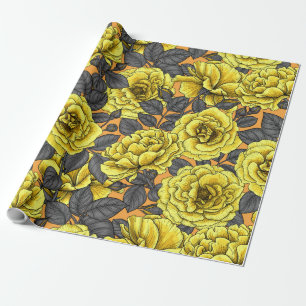 Gele rozen met grijze bladeren op sinaasappel cadeaupapier