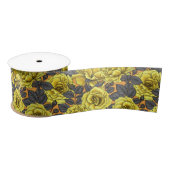 Gele rozen met grijze bladeren op sinaasappel lint (Spoel)