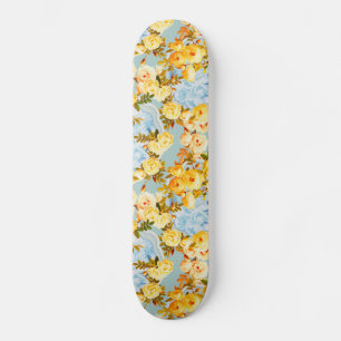 Gele rozen op blauw en blauwgroen skateboard