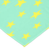 Gele sterren op turkooise tafelkleed (Gekanteld)
