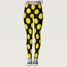 Gele stippenleggings op zwarte ondergrond