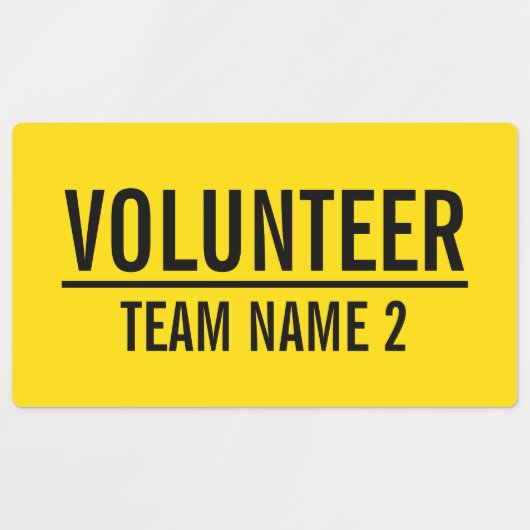 Gele vrijwilligersbadge met de naam van het team v labels (Design 2)