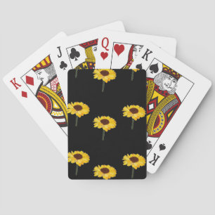 Gele zonnebloemen op zwart pokerkaarten