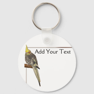 Gelede kakatiel op een vertakking met wit sleutelhanger