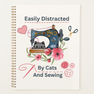 Gemakkelijk afgeleid door katten en naaimachinelie planner