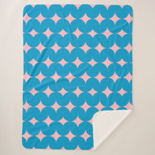 Geometrisch mid-century patroon in blauw en roze sherpa deken