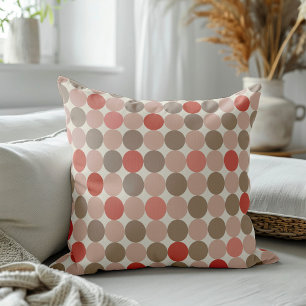 Geometrisch patroon van rode, bruine, roze stippen kussen