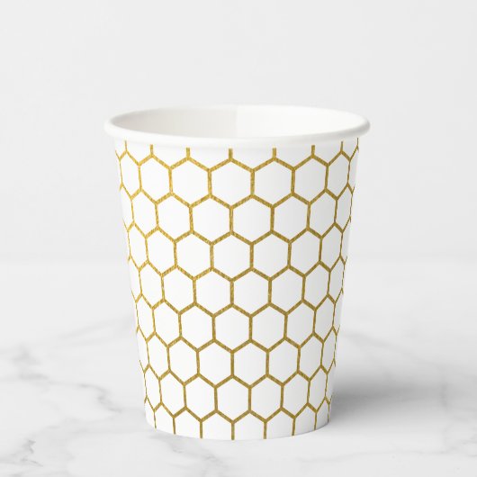 Geometrisch patroon van witte en goudhexagon papieren bekers (Links)