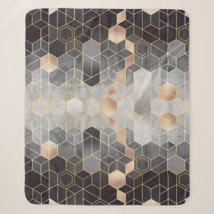 Geometrische abstractie van zeshoeken op zwart en  sherpa deken